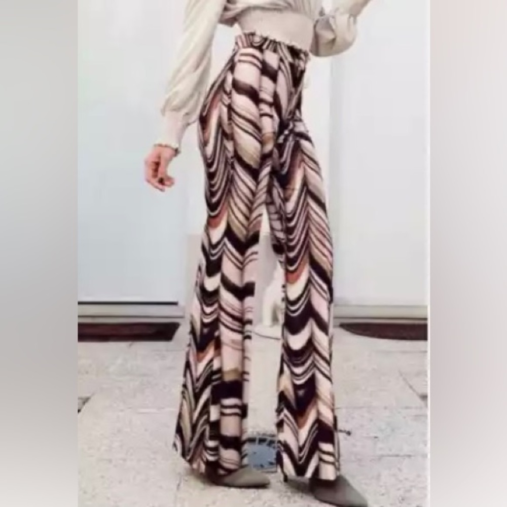 ZARA HIGH-WAISTED
MARBLE PRINTED FLARE
PANTS NEUTRALS M MEDIUM